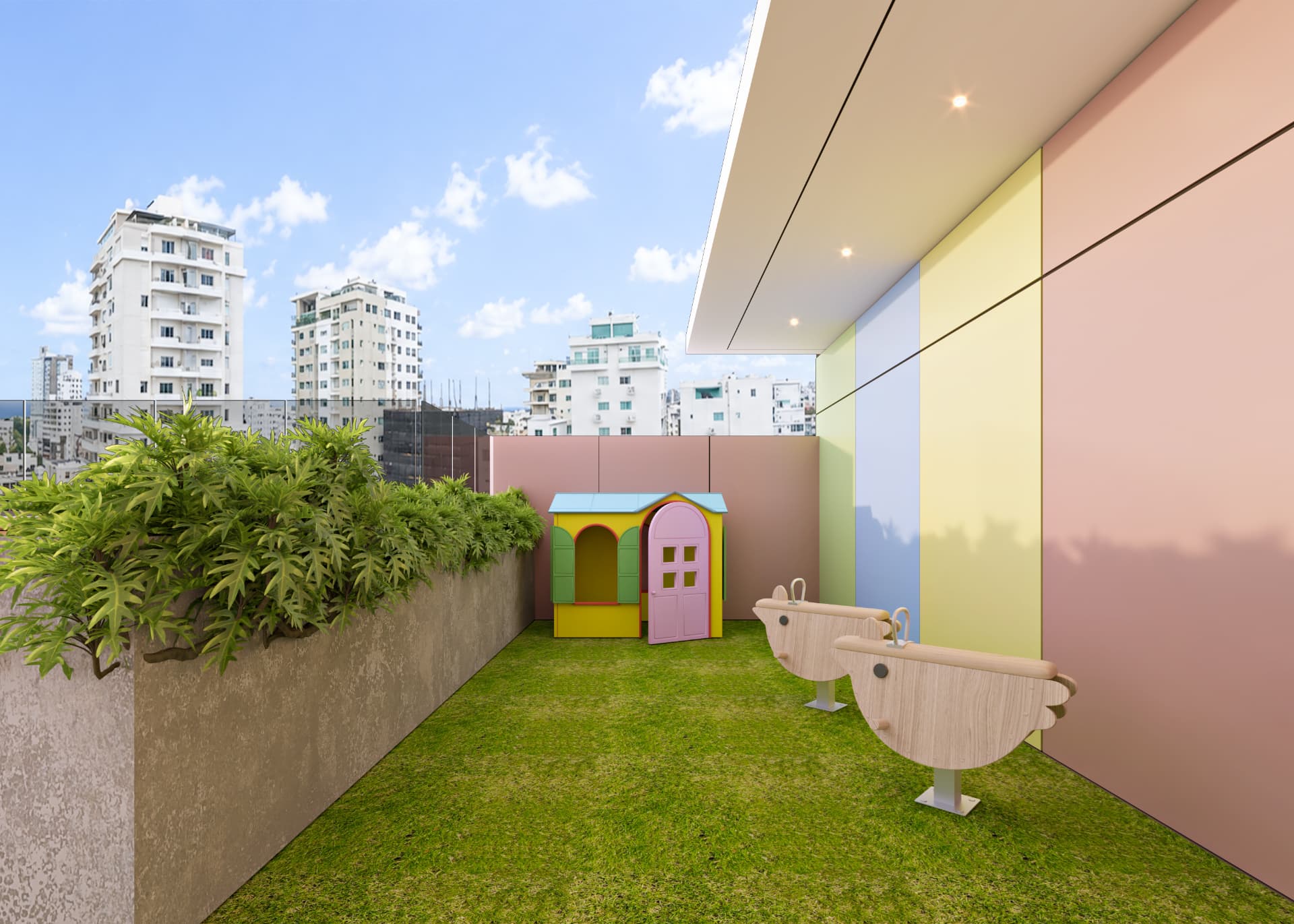 Área infantil. Terraza de juegos con césped y balancines, segura y dentro del edificio.